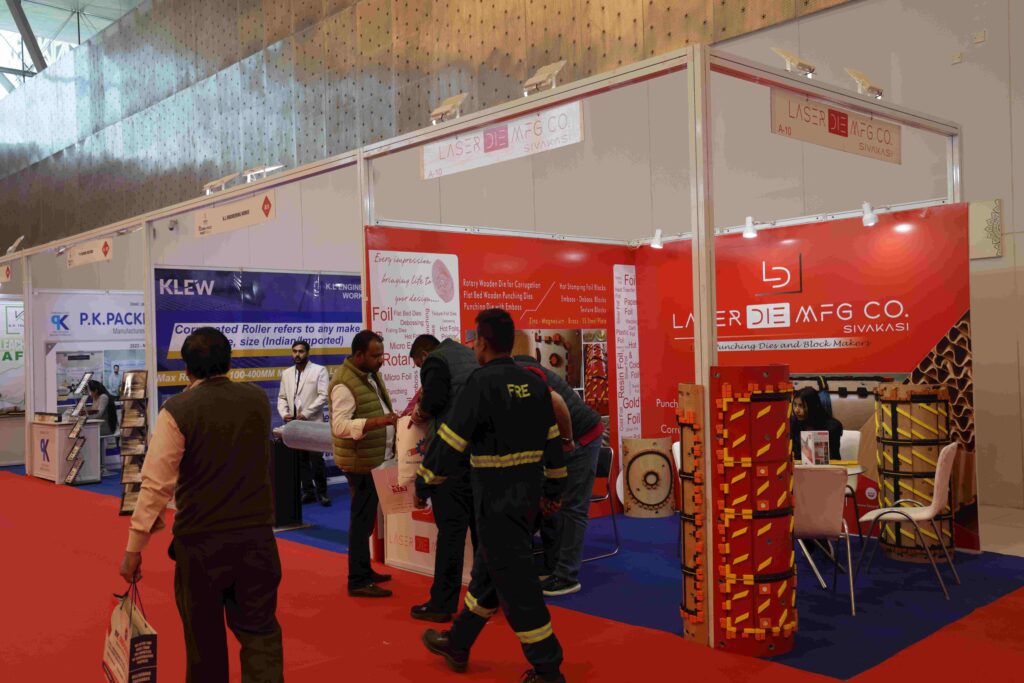 Visitors interacting with exhibitors at Corru Pack Print India packaging exhibition