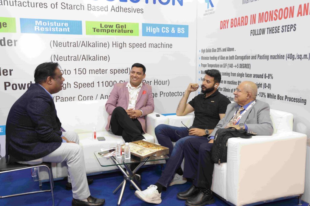 Visitors exploring packaging technology at Corru Pack Print India exhibition