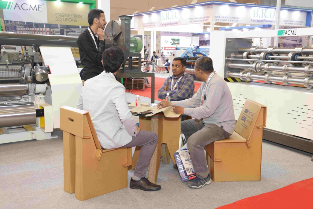 Business visitors exploring packaging technology at Corru Pack Print India exhibition